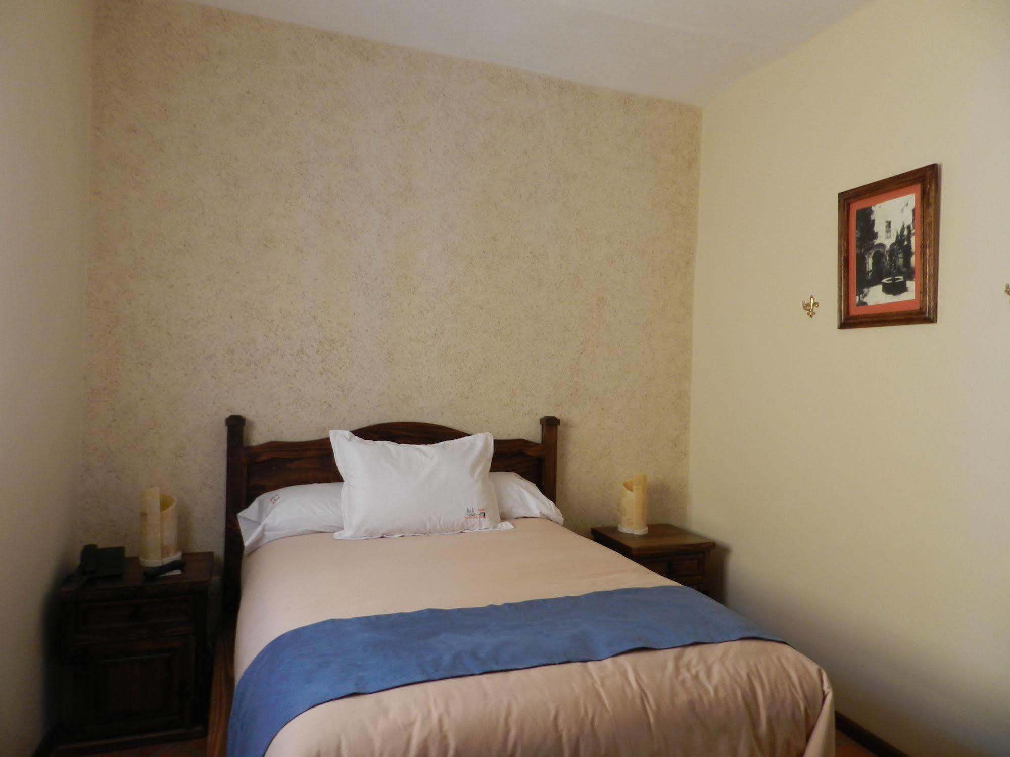 Collection O Al Otro Lado Del Rio, Puebla Hotel Екстериор снимка A bedroom at the hotel